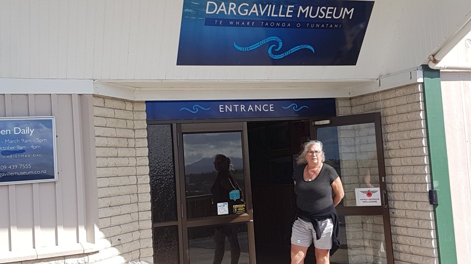 Sarah at the entrance to the museum